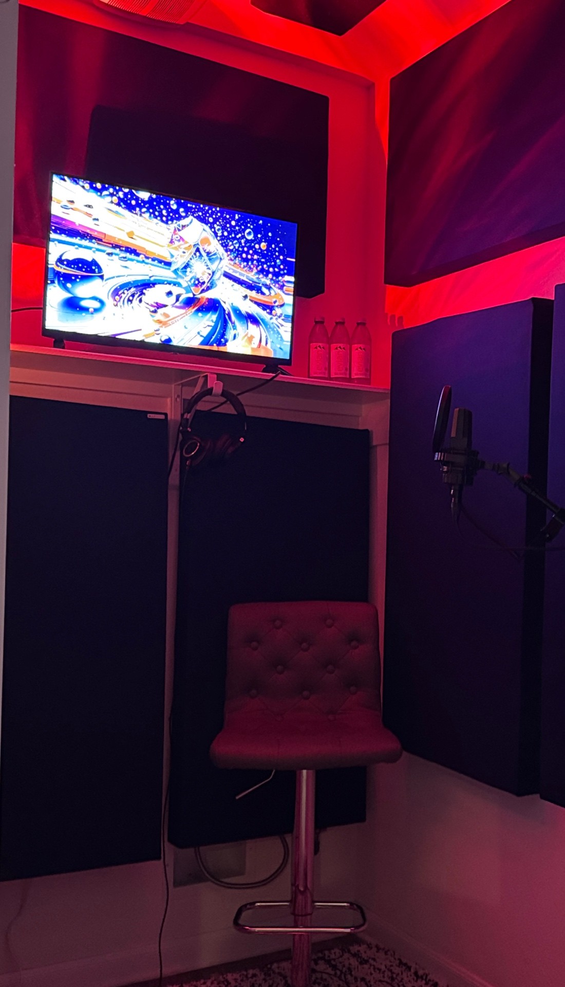 Lunar Mansion Studios recording studio in West Houston TX — professional control room with analog mixing console, outboard gear, and cyan LED lighting
