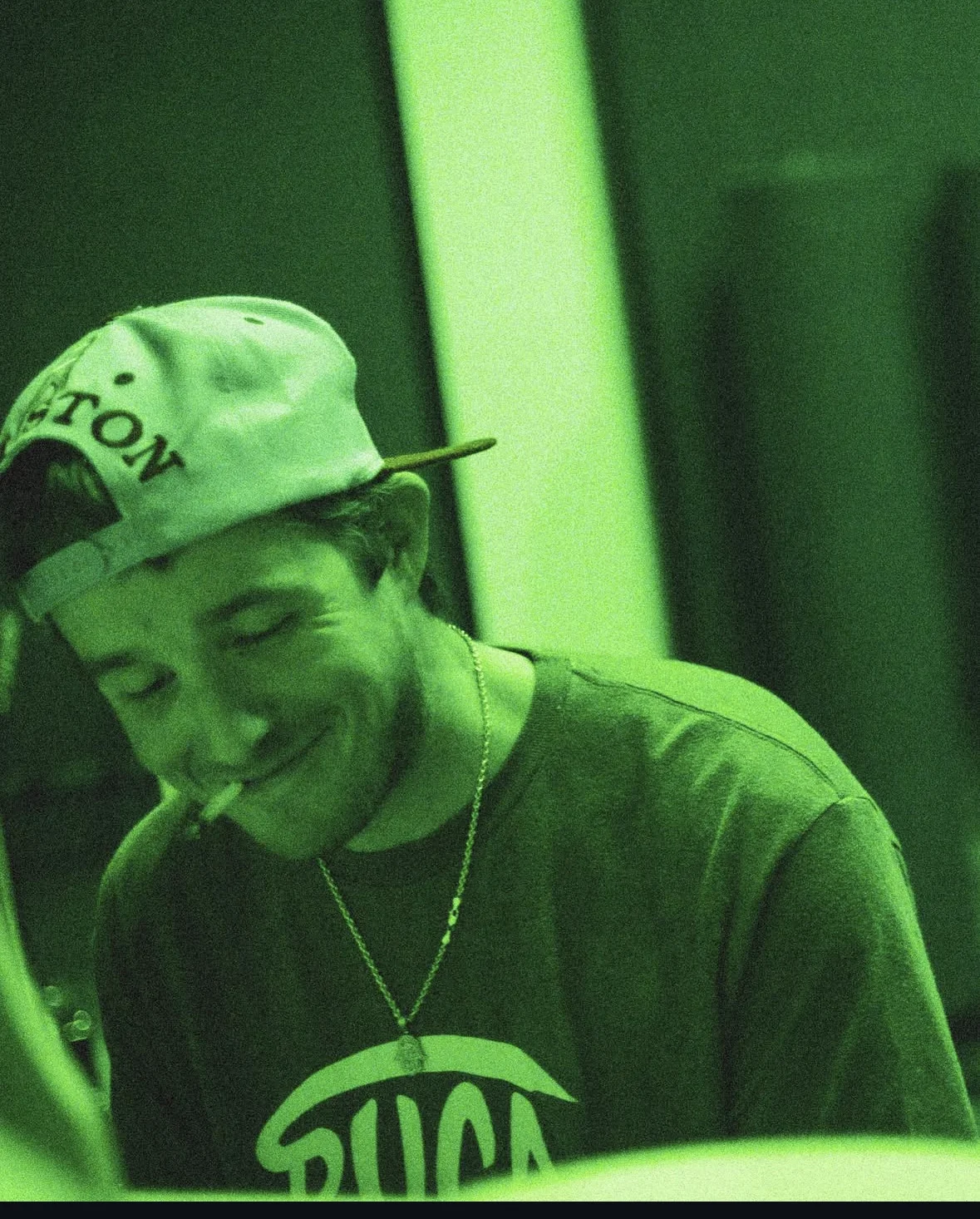 Matt O'Neil in the studio under green lighting — Lunar Mansion Studios Houston TX