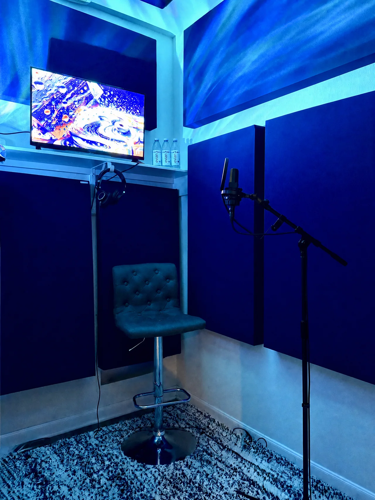 Lunar Mansion Studios vocal suite — acoustically treated vocal recording booth with AKG C414 microphone and ambient LED lighting in West Houston